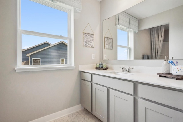 bathroom featuring tile patterned floors and vanity