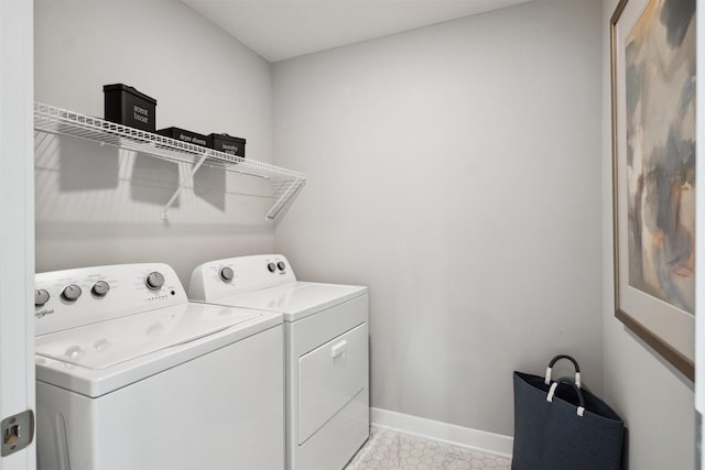 laundry room featuring washing machine and dryer