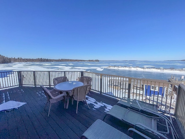 deck featuring a water view