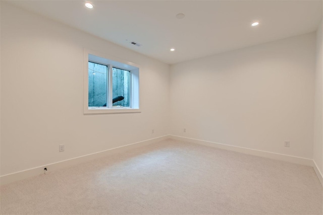 view of carpeted spare room