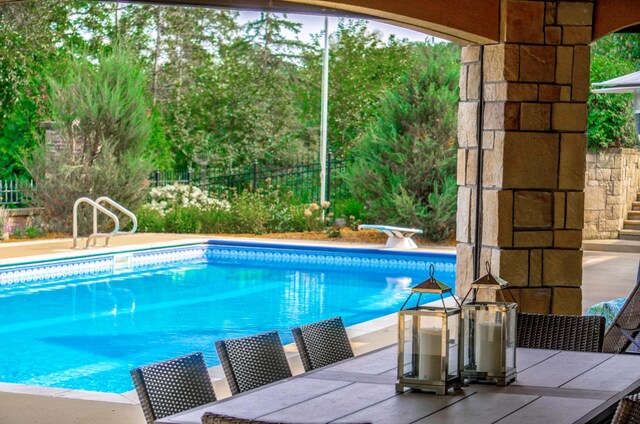 view of pool with a patio area