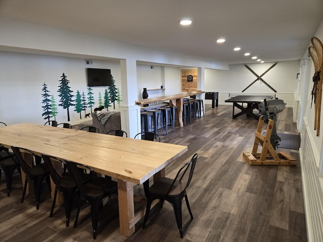 dining space with dark hardwood / wood-style floors