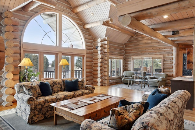 living room with wood ceiling, hardwood / wood-style floors, and beam ceiling