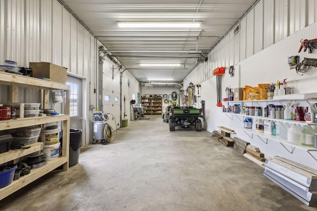 garage featuring a workshop area