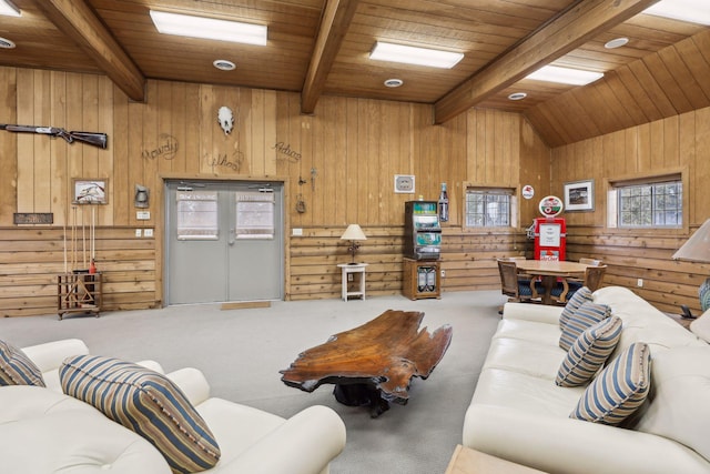 living room featuring wood walls, wooden ceiling, lofted ceiling with beams, and carpet floors