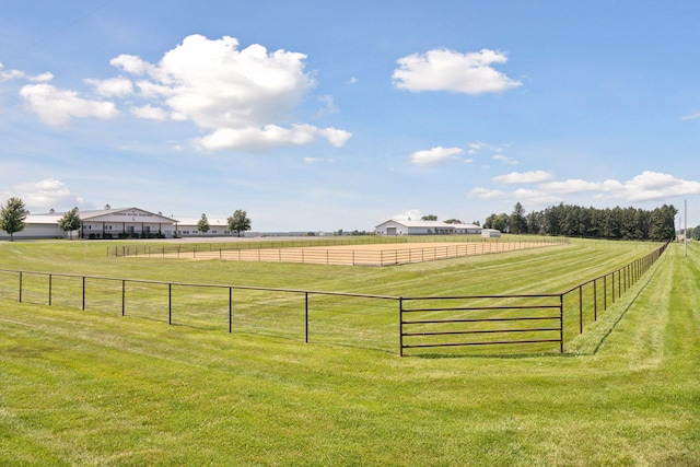 view of yard with a rural view