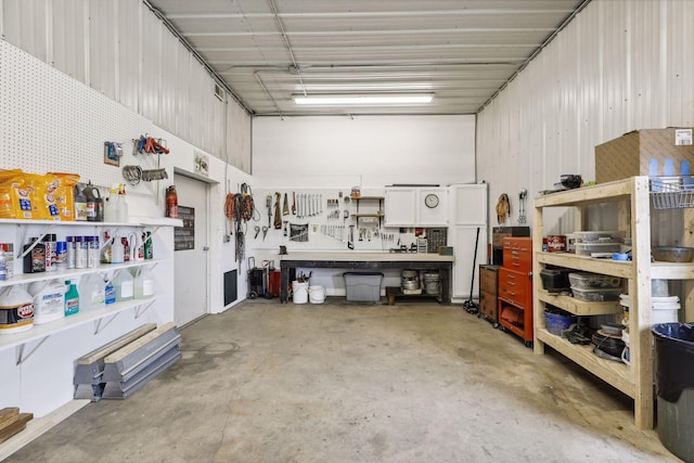 garage with a workshop area