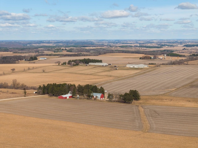 birds eye view of property with a rural view