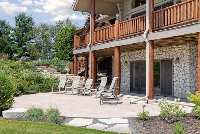 view of patio with a balcony