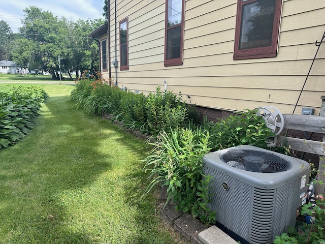 view of yard with central AC