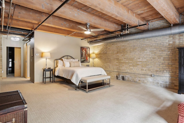 carpeted bedroom with brick wall, wooden ceiling, and beamed ceiling