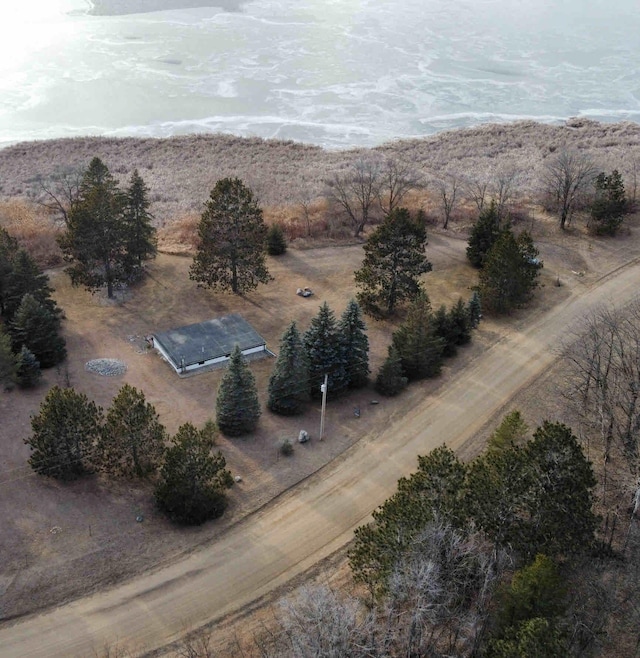 drone / aerial view with a water view and a rural view