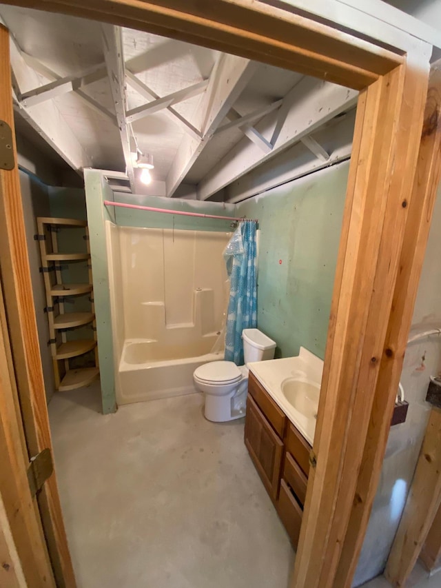 full bathroom with vanity, toilet, concrete floors, and shower / bathtub combination with curtain