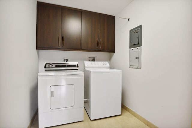 laundry area featuring cabinets and independent washer and dryer