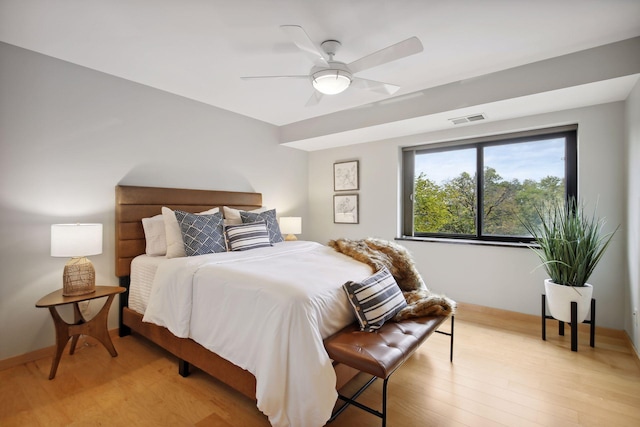 bedroom featuring light wood-type flooring and ceiling fan