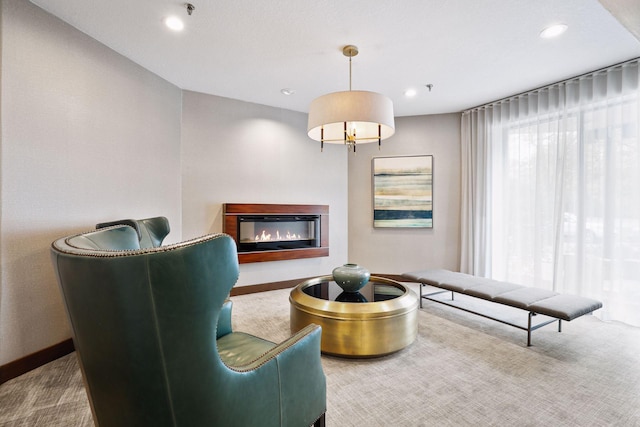 sitting room featuring carpet