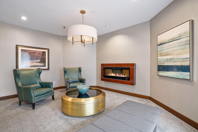 sitting room featuring carpet floors