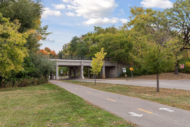 view of property's community with a yard