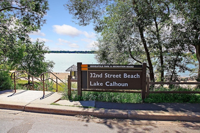 view of home's community with a water view