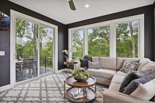 sunroom with ceiling fan