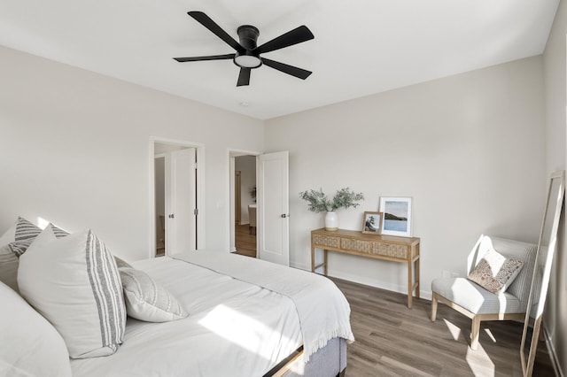 bedroom featuring ceiling fan and wood-type flooring