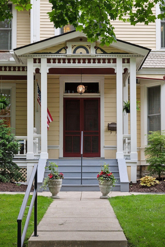 property entrance featuring a porch