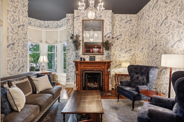 living room with a chandelier and dark wood-type flooring