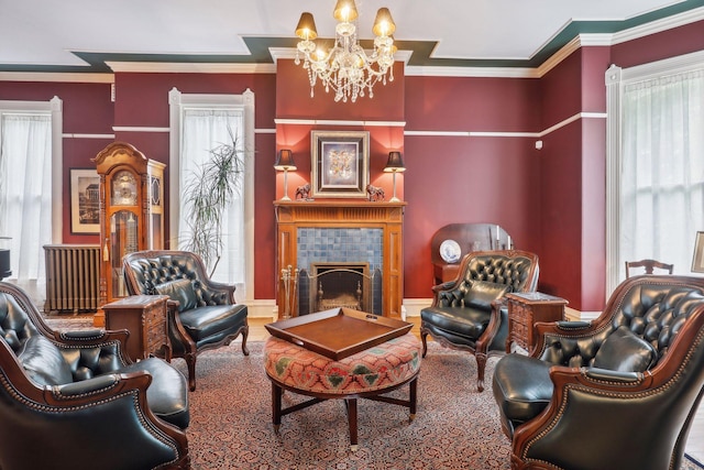 living room featuring plenty of natural light and crown molding