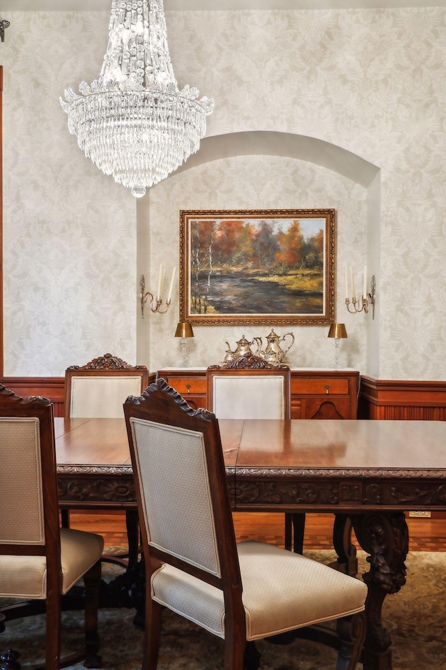 dining space featuring an inviting chandelier