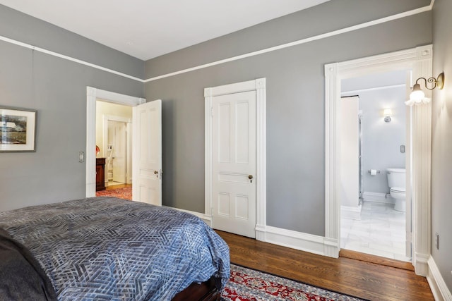 bedroom featuring dark wood-type flooring