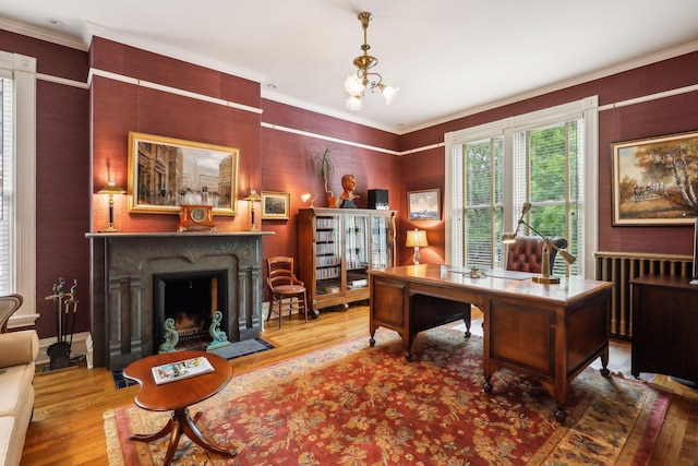 office area with a chandelier, crown molding, and wood-type flooring