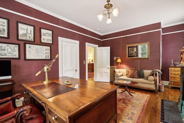 office area with an inviting chandelier, dark hardwood / wood-style floors, and ornamental molding