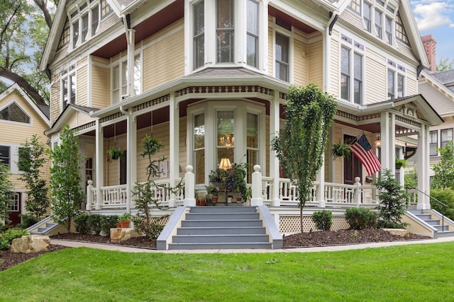 property entrance featuring covered porch