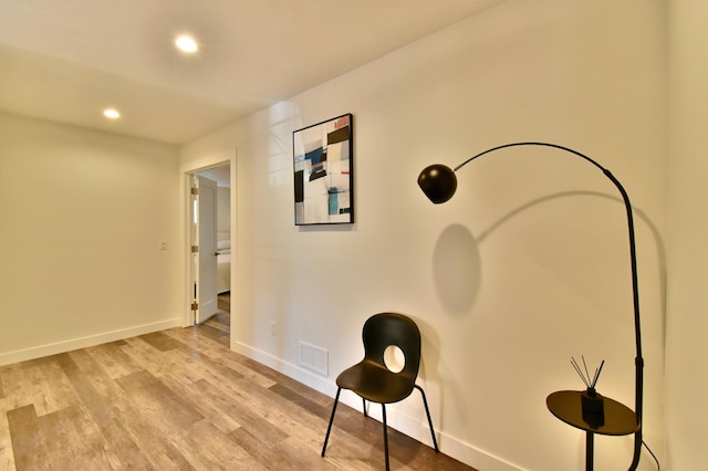 hall featuring light hardwood / wood-style flooring