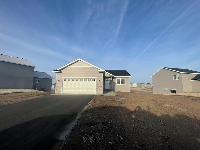 view of front of property with a garage