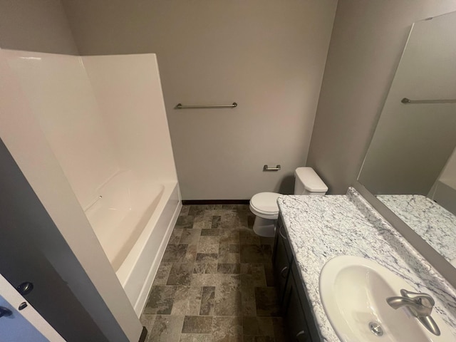 full bathroom with shower / bathing tub combination, toilet, large vanity, and tile flooring