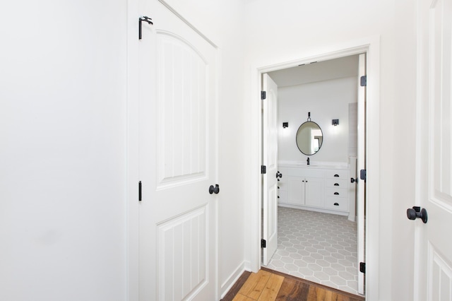 hall featuring tile flooring