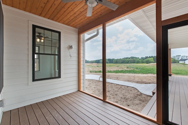 wooden deck with ceiling fan