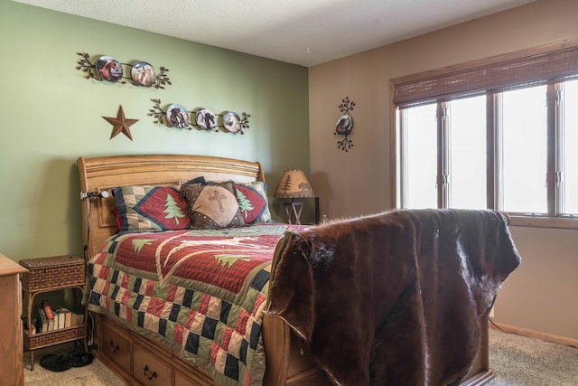 bedroom featuring light colored carpet