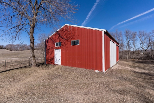 view of outbuilding featuring a garage