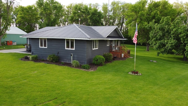 view of property exterior featuring a yard