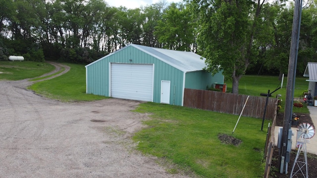 garage with a lawn