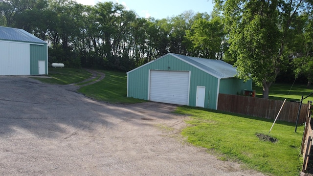 garage with a yard