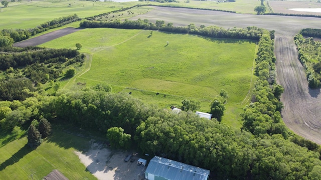 birds eye view of property featuring a rural view