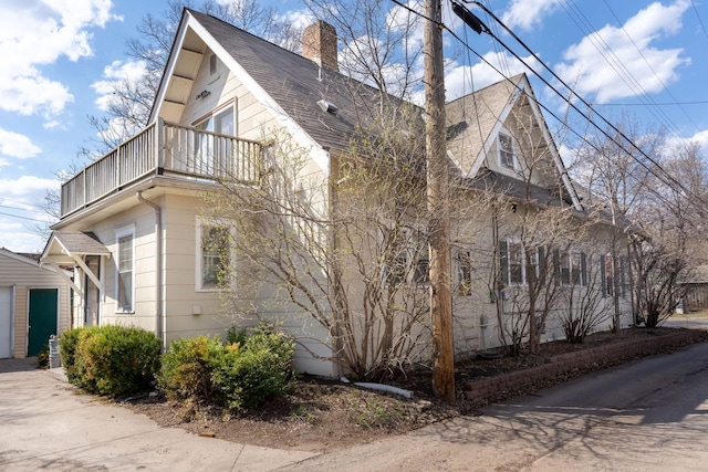 view of property exterior featuring a balcony