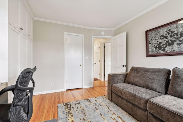 office area featuring hardwood / wood-style flooring and crown molding