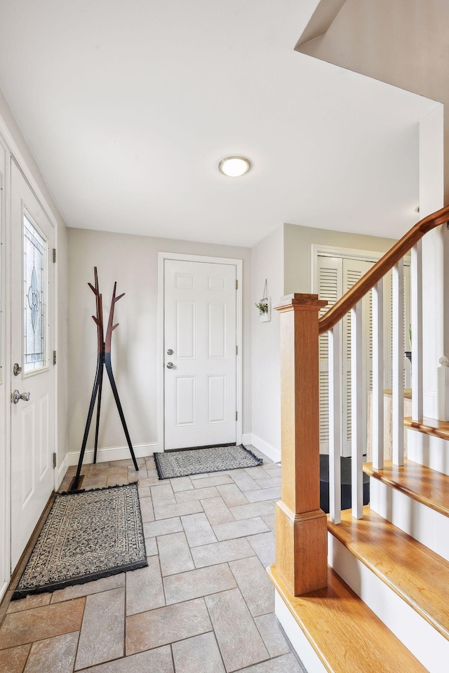 view of tiled foyer entrance