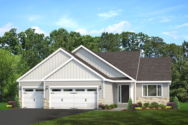 craftsman house with a garage and a front yard