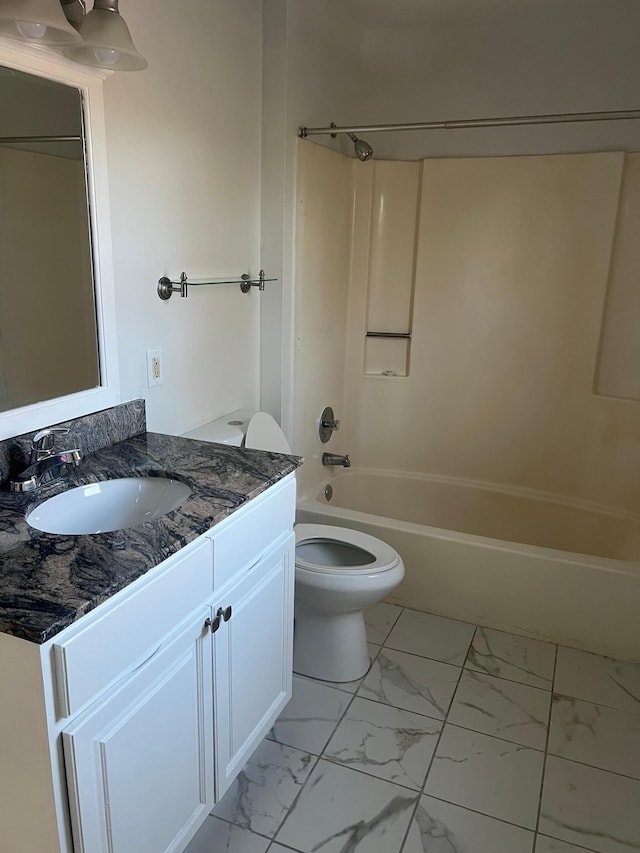 full bathroom with vanity, bathtub / shower combination, and toilet