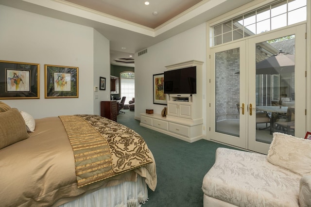 carpeted bedroom with access to exterior and french doors